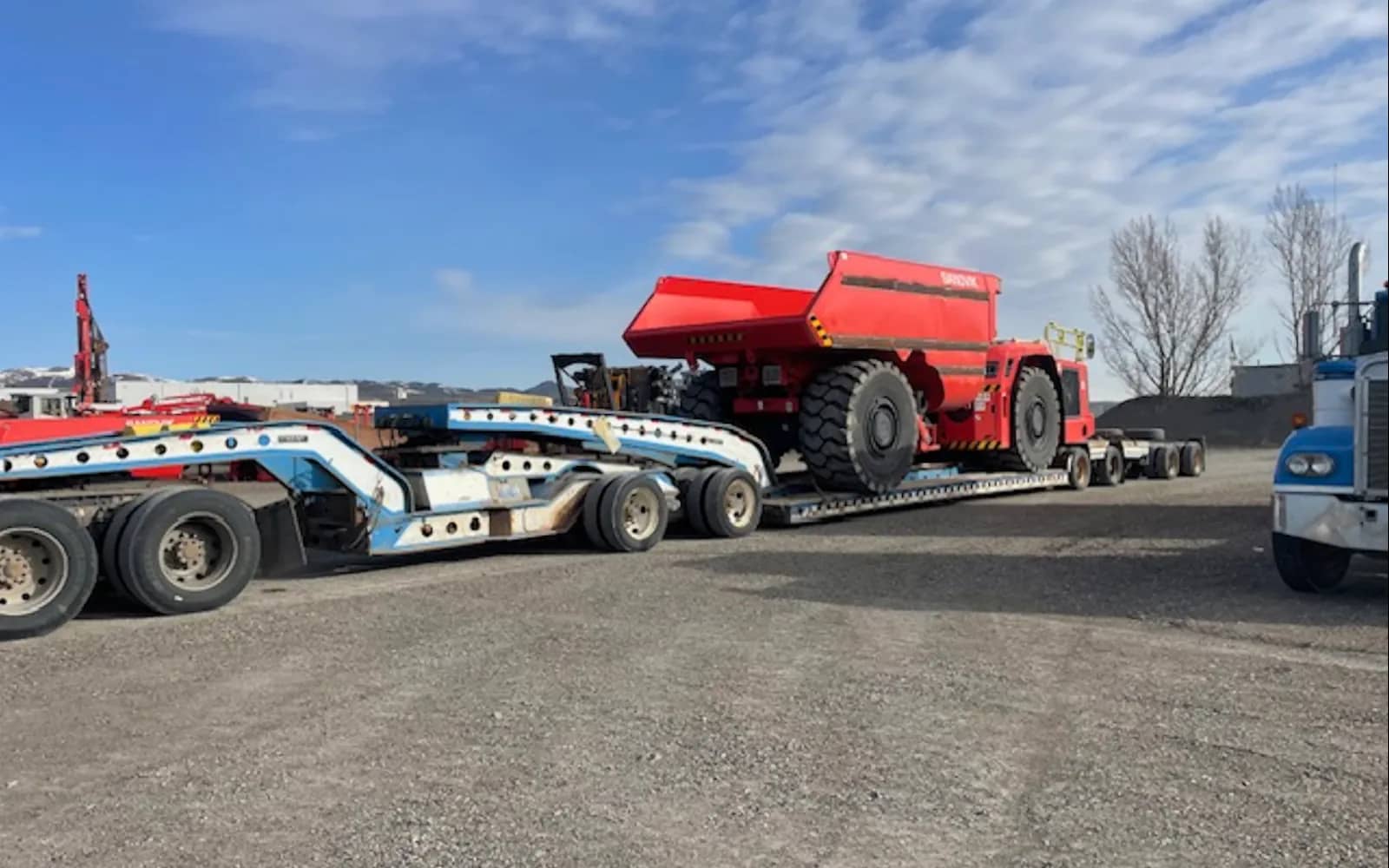 Underground haul truck secured for transport